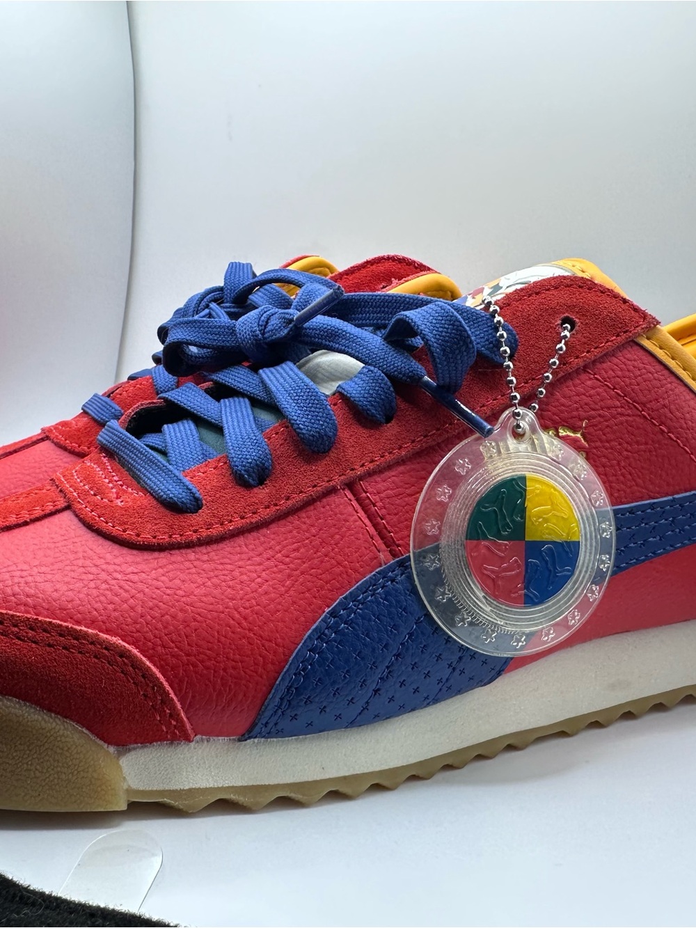 Puma Kids Red Sneakers with Blue Accents